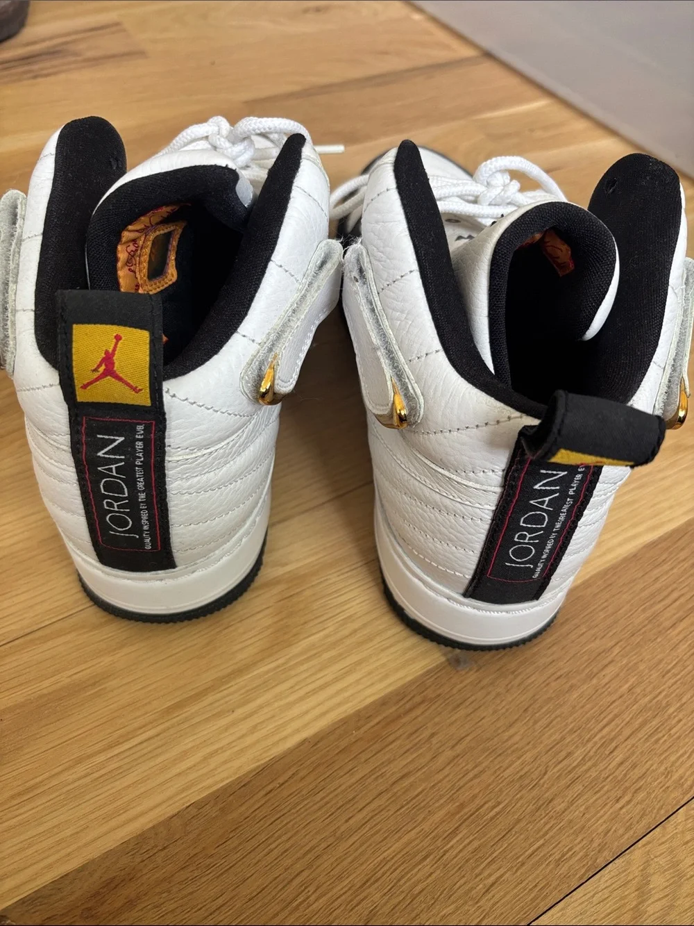 Jordan Force Taxi 12 White and Black High-Top Sneakers 8.5